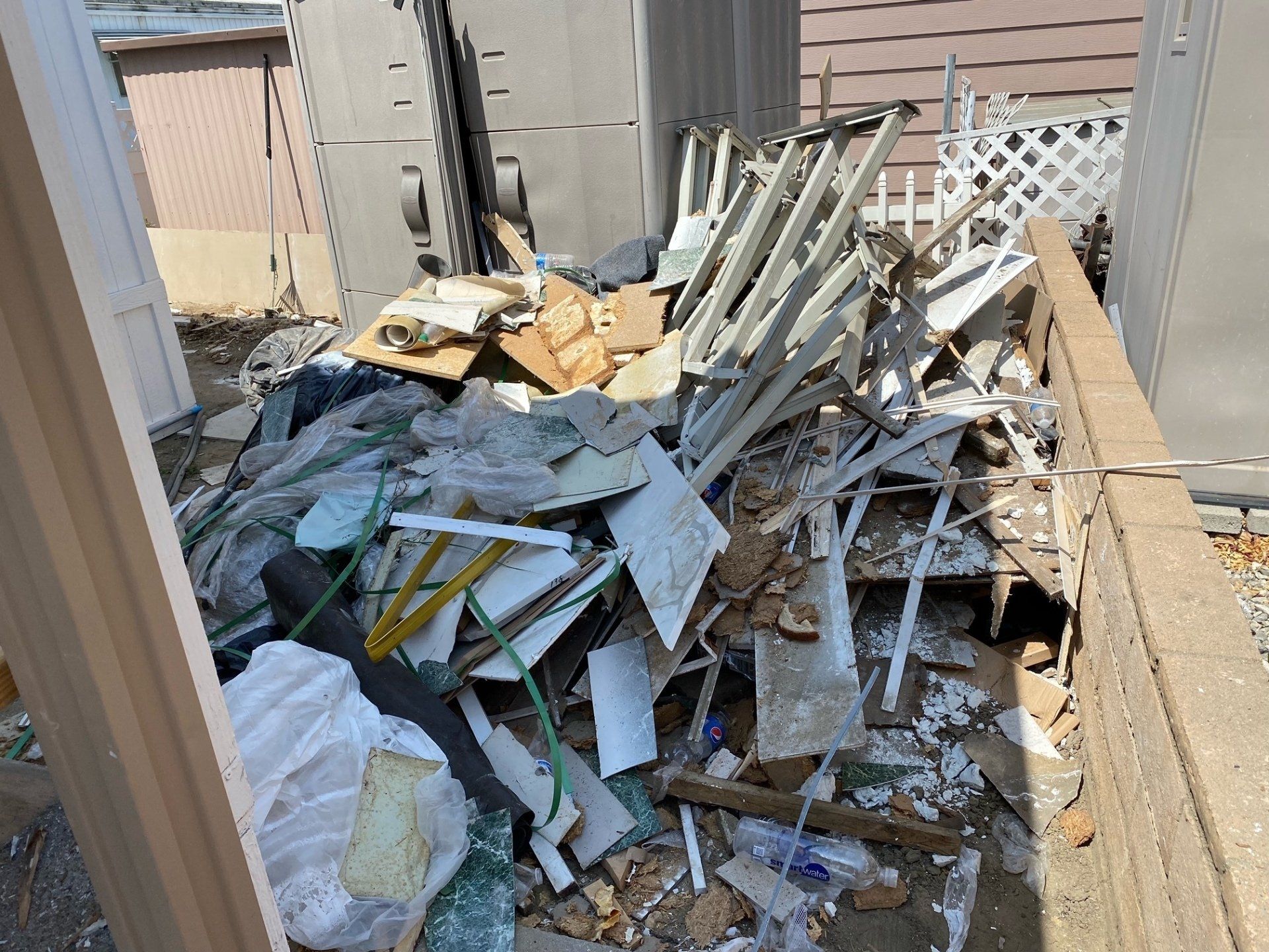 Demolition debris hauled by Junk Champions